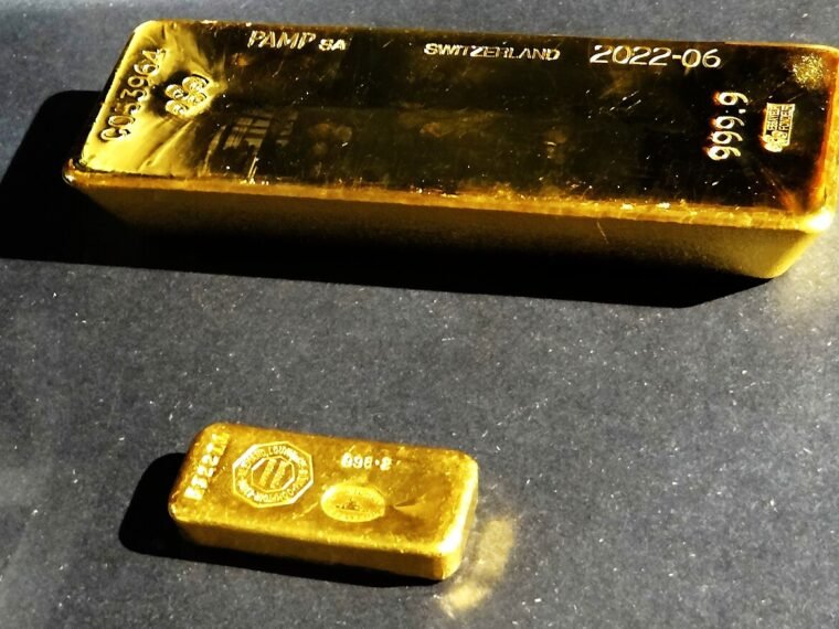 Two real gold bars photographed on display at the Banque de France.