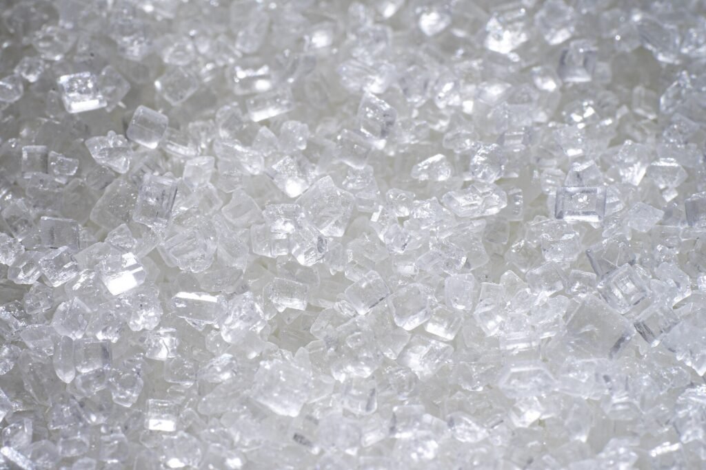 White granulated beet sugar photographed in close-up.