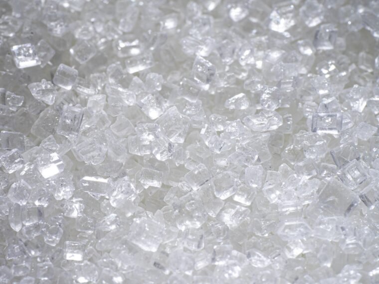 White granulated beet sugar photographed in close-up.