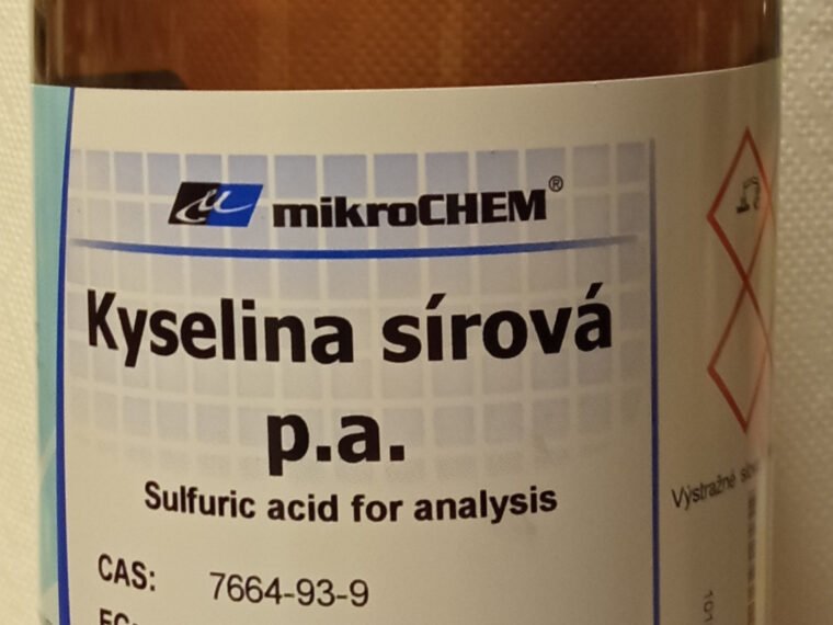 A labelled laboratory bottle of sulphuric acid.